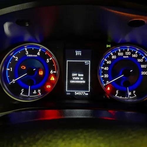 Toyota Hilux dashboard showing DPF full warning light